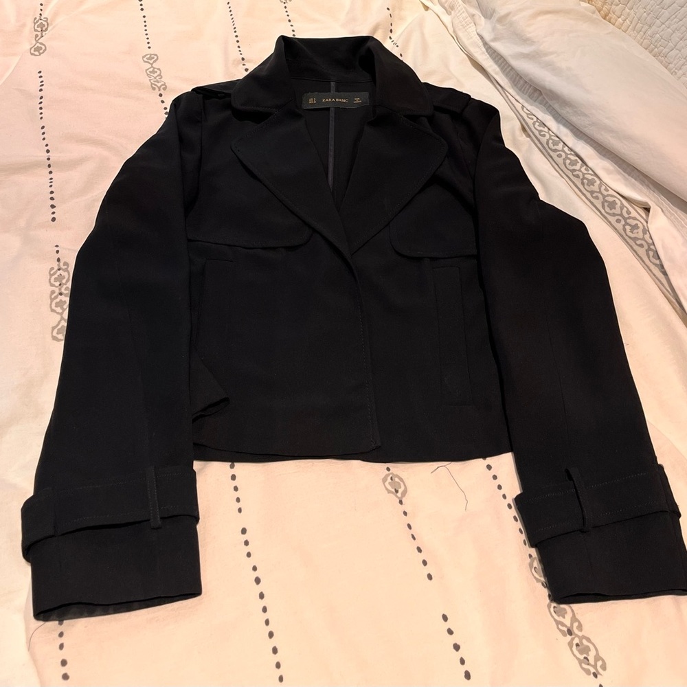 Drapey short trench.